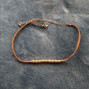 Gold Beaded Choker on Brown Cord